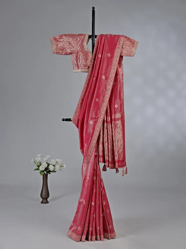Pastel red dola silk saree with zari sparkle