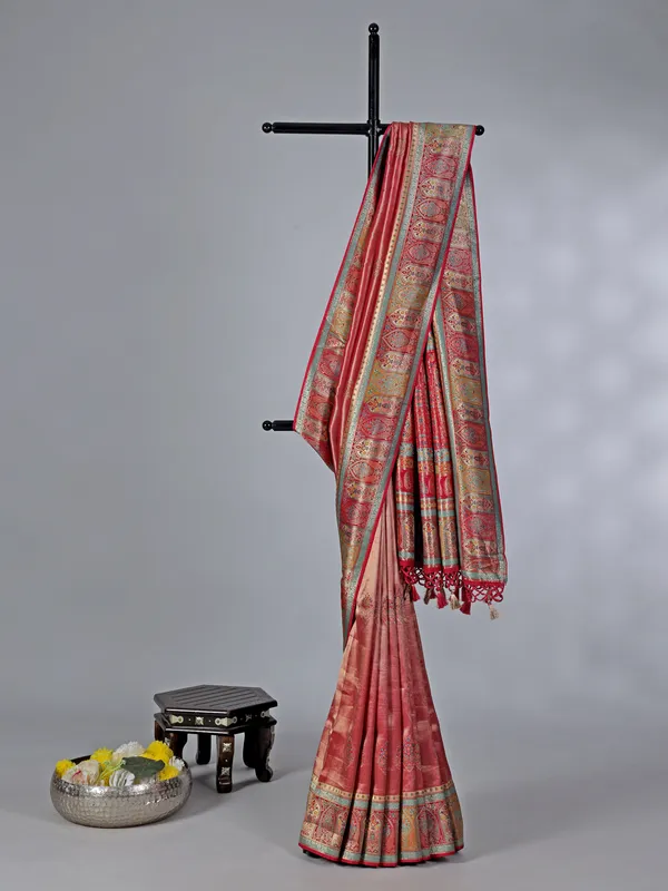 Pastel red dola tissue silk saree with contrast border