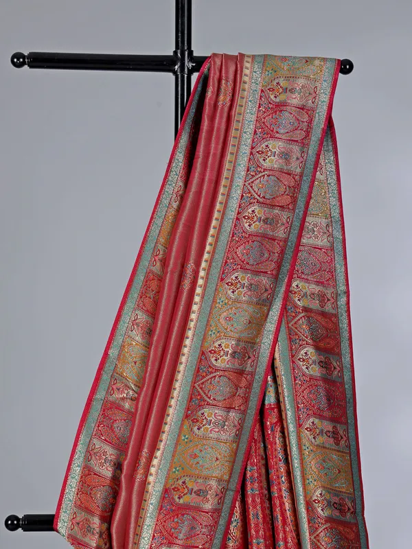 Pastel red dola tissue silk saree with contrast border