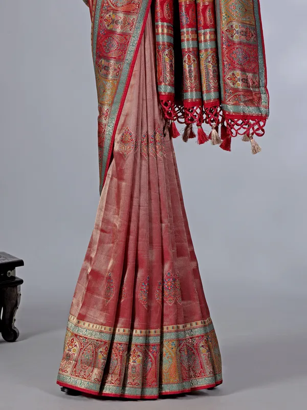 Pastel red dola tissue silk saree with contrast border