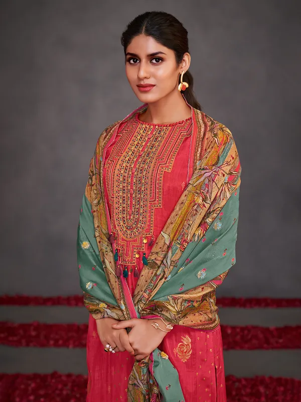Pastel red embroidered muslin silk salwar suit