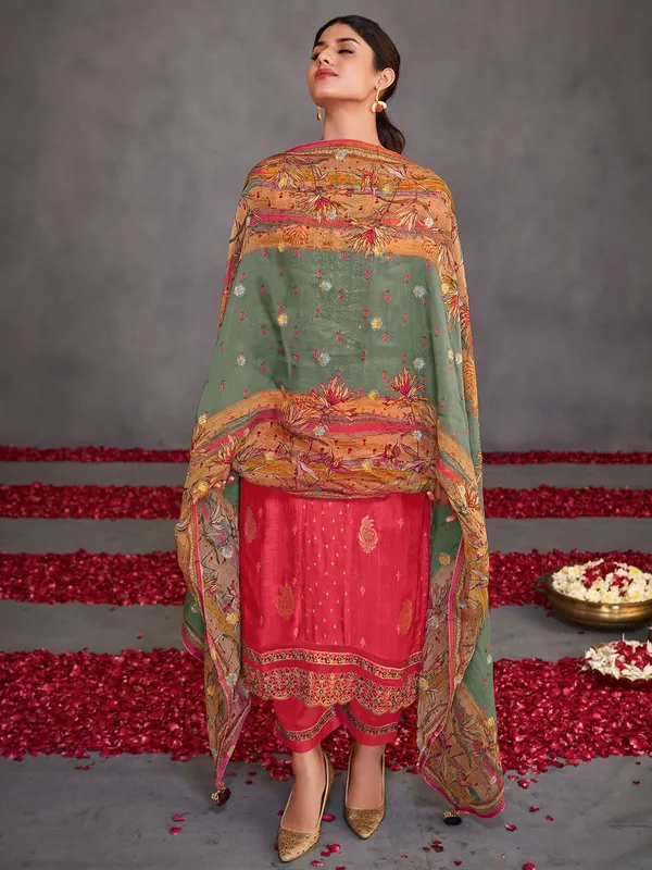 Pastel red embroidered muslin silk salwar suit