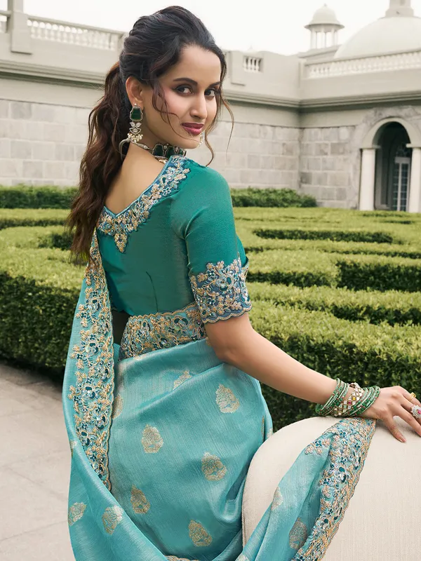 Pastel sky blue tissue silk saree with subtle detailing