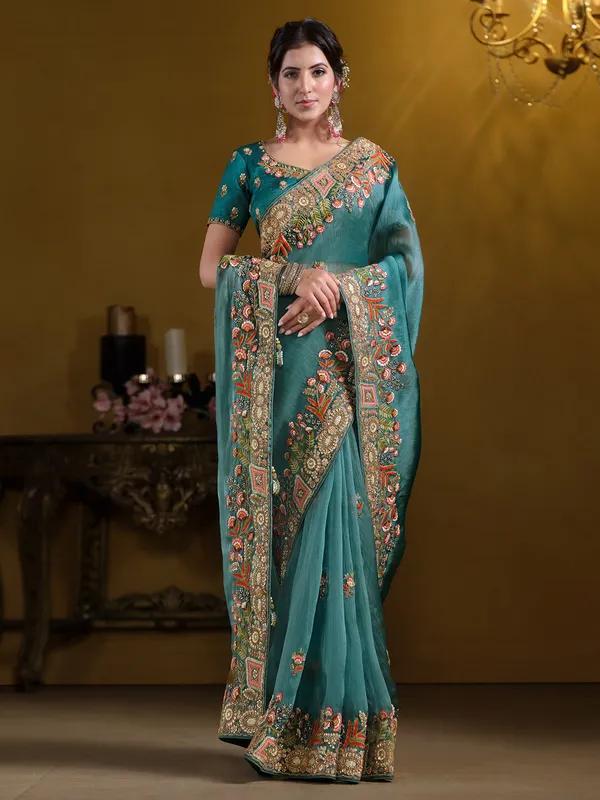 Pastel teal tissue silk saree with zardosi