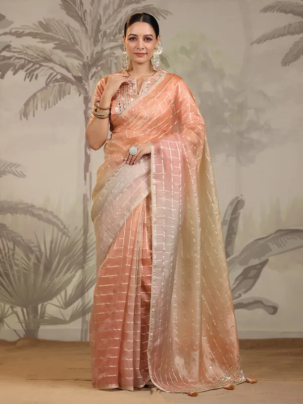 Peach and cream organza saree