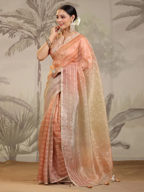 Peach and cream organza saree