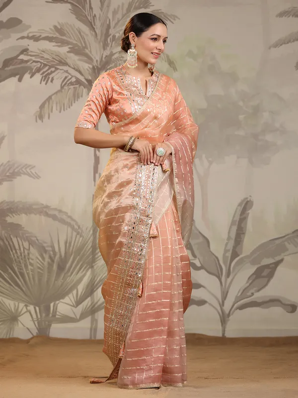 Peach and cream organza saree