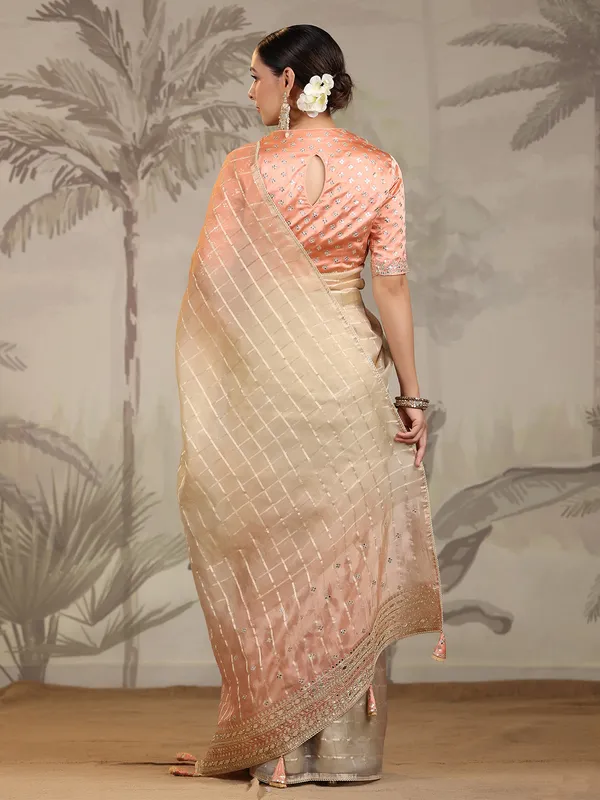 Peach and cream organza saree