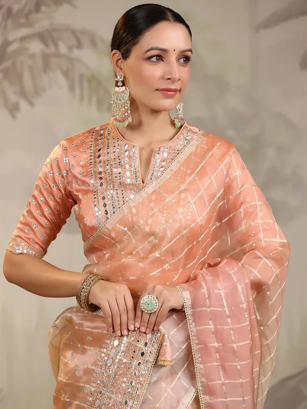 Peach and cream organza saree