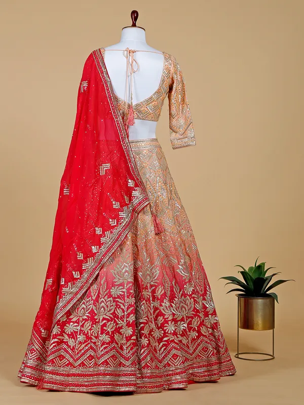 Peach and red shaded lehenga choli