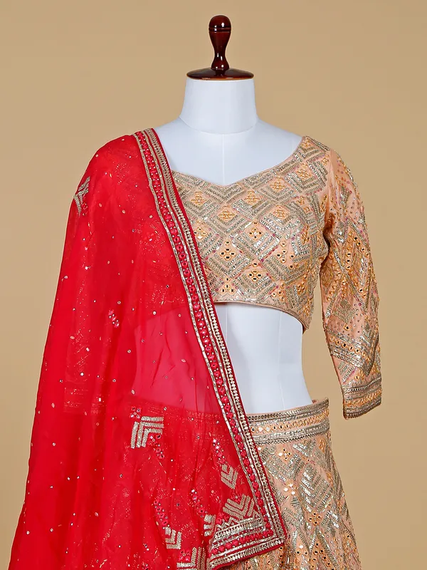 Peach and red shaded lehenga choli