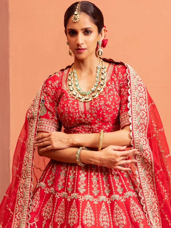 Peach bridal lehenga choli with elbow sleeves