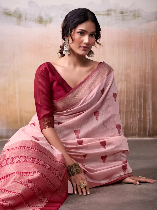 Peach cotton saree with bold maroon border