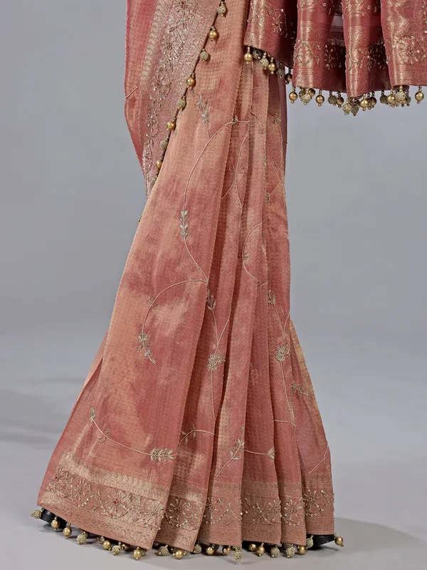 Peach dola tissue silk wedding wear saree with zari weaving