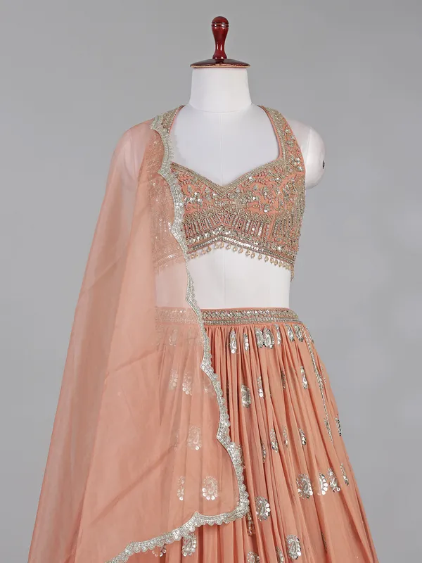 Peach georgette lehenga choli with mirror accents
