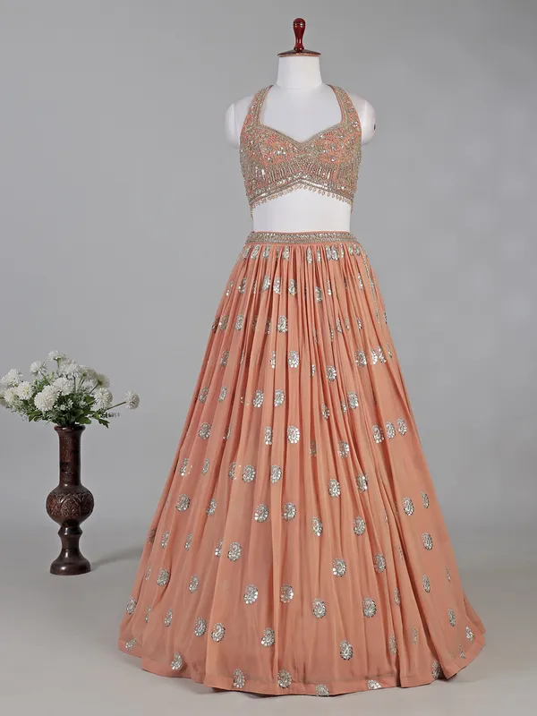 Peach georgette lehenga choli with mirror accents