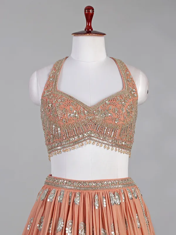 Peach georgette lehenga choli with mirror accents