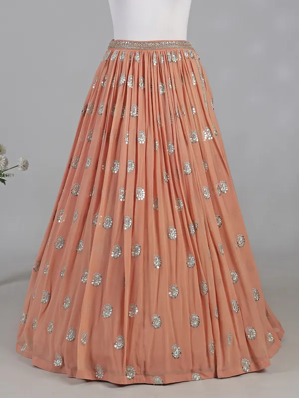 Peach georgette lehenga choli with mirror accents