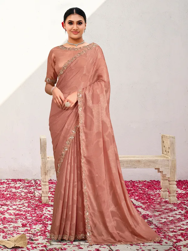 Peach georgette saree with resham and bead work