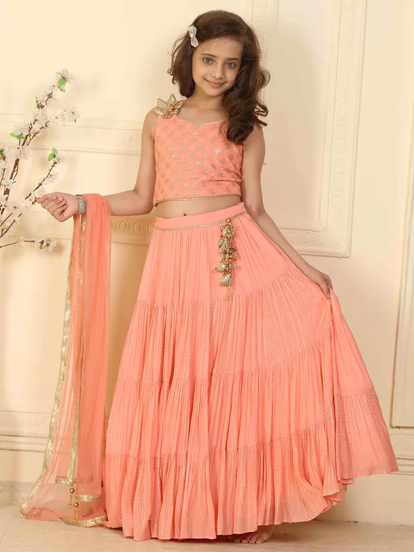 Peach hued lehenga choli in georgette for wedding event