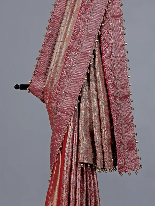 Peach kanjivaram silk saree with regal zardosi craft