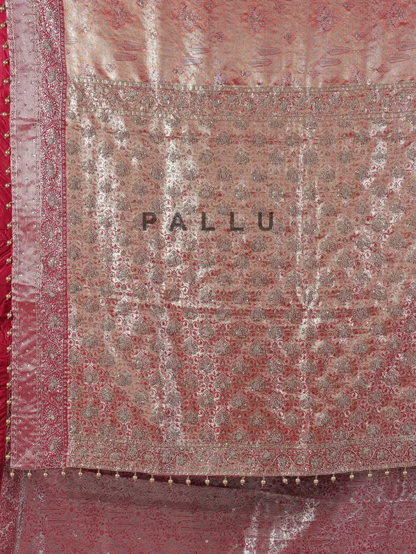 Peach kanjivaram silk saree with regal zardosi craft