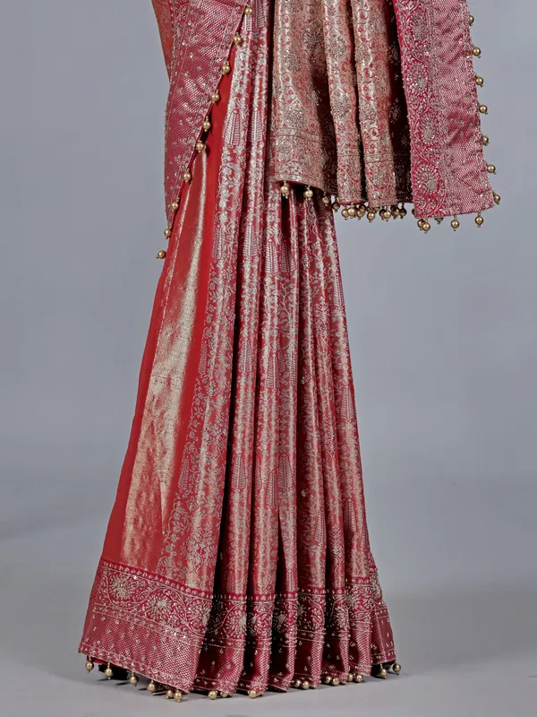 Peach kanjivaram silk saree with regal zardosi craft