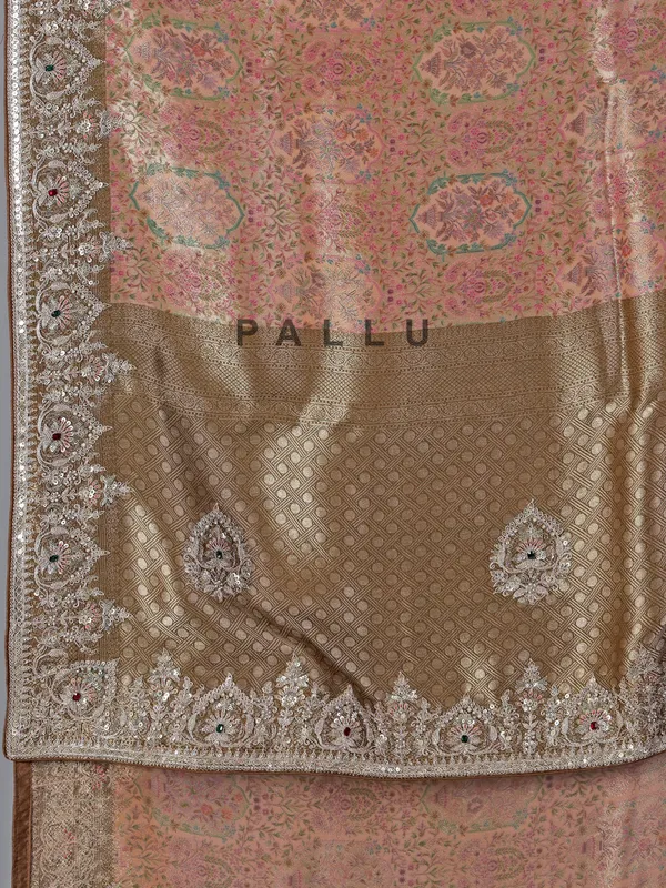 Peach kanjivaram with colorful motifs saree