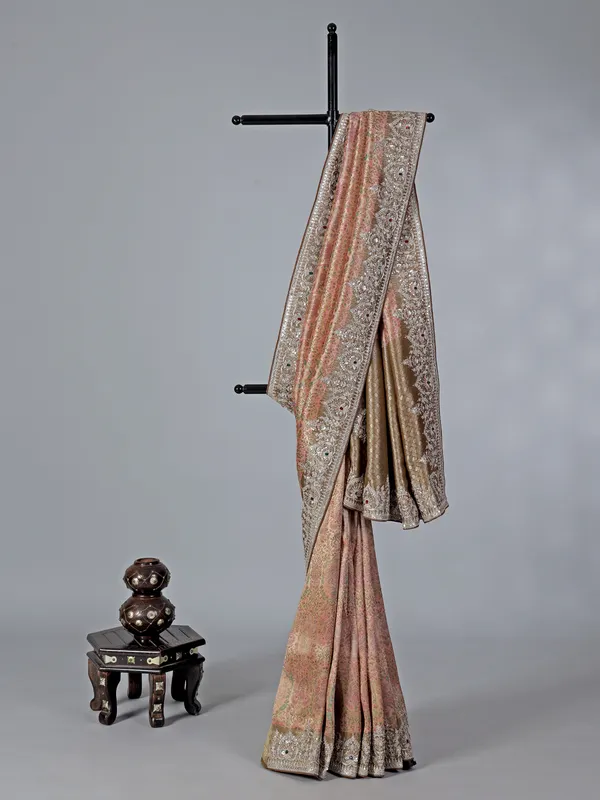 Peach kanjivaram with colorful motifs saree