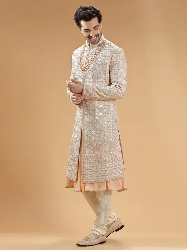 Peach lavish groom sherwani in raw silk