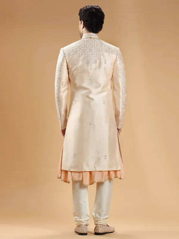 Peach lavish groom sherwani in raw silk