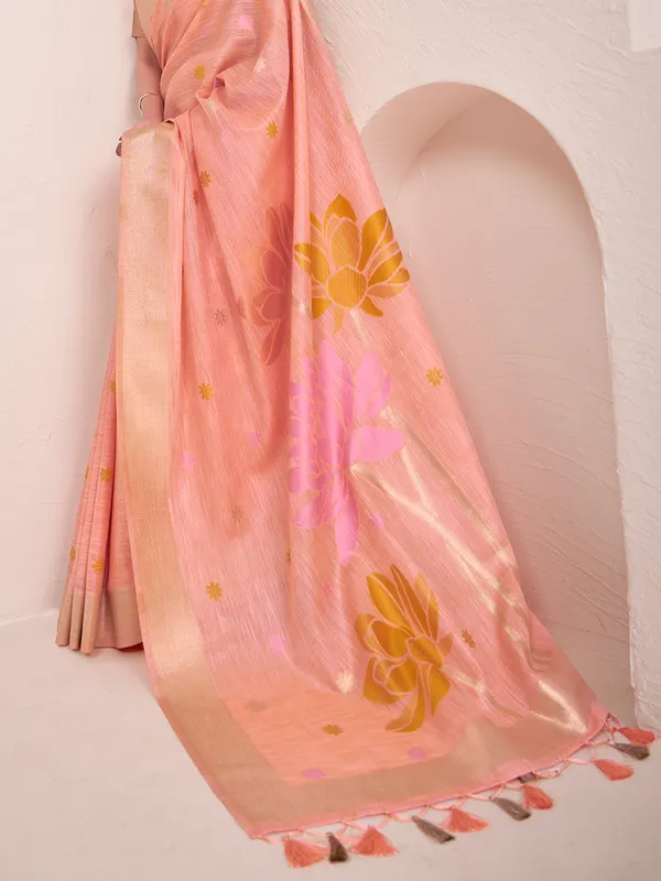 Peach linen saree with zaro worked border
