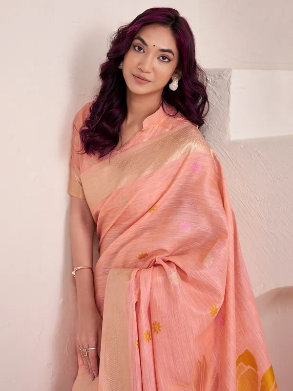 Peach linen saree with zaro worked border