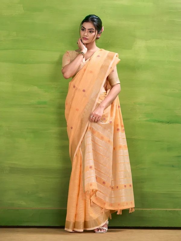 Peach linen silk saree with festive charm