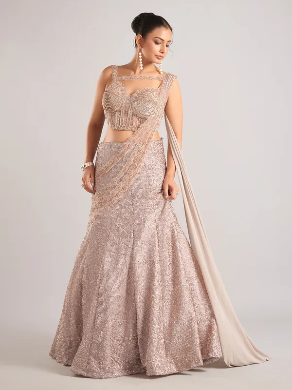 Peach net designer lehenga choli with dupatta