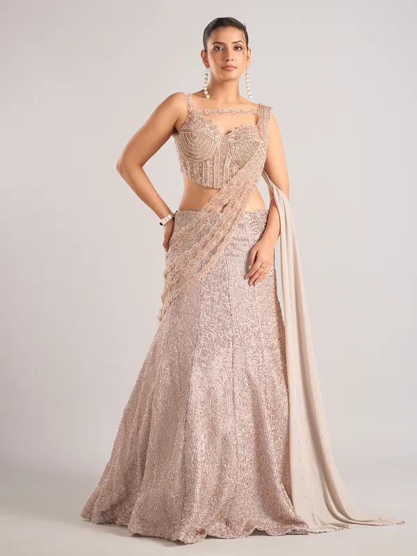 Peach net designer lehenga choli with dupatta