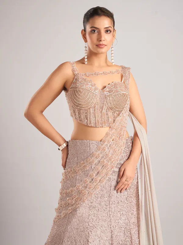 Peach net designer lehenga choli with dupatta