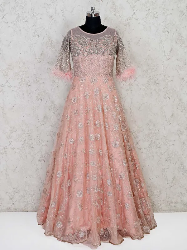 Peach net wedding designer gown