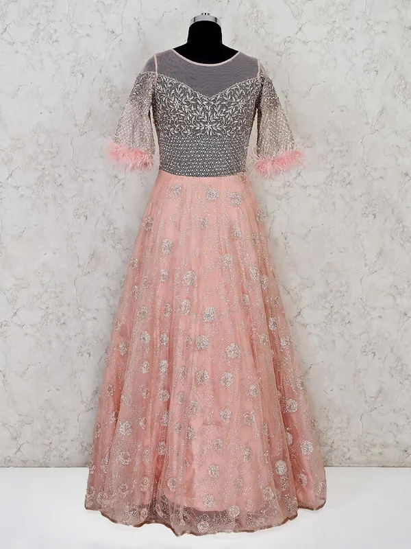 Peach net wedding designer gown
