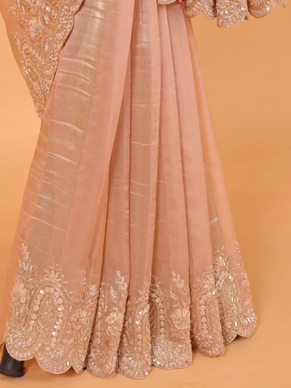 Peach organza saree for wedding wear