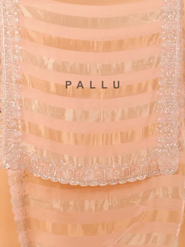 Peach organza saree for wedding wear