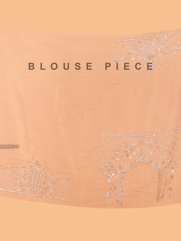 Peach organza saree for wedding wear