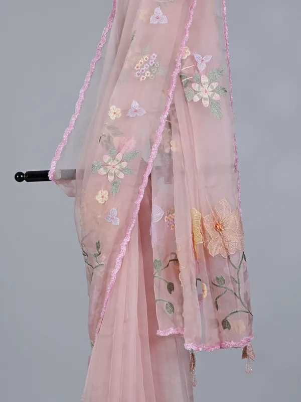 Peach organza saree with embroidered delight