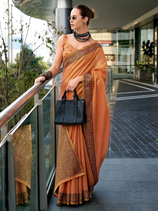 Peach printed linen tissue silk saree