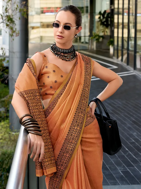 Peach printed linen tissue silk saree