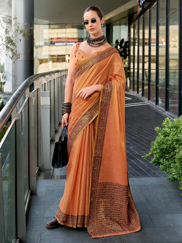 Peach printed linen tissue silk saree