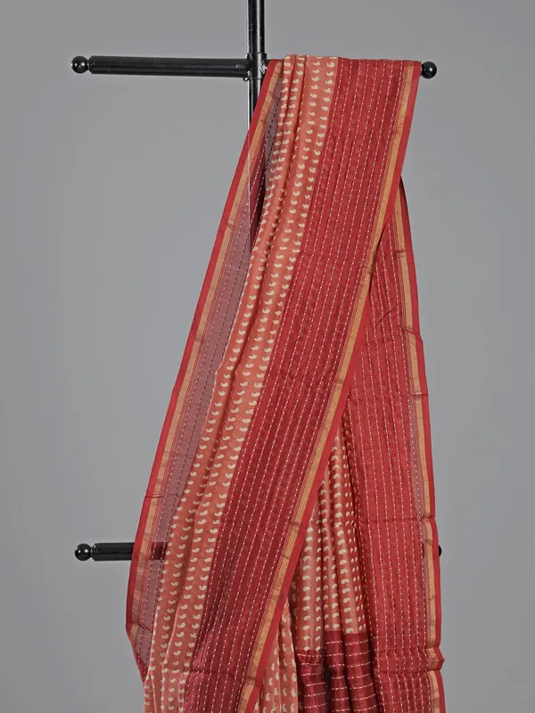 Peach printed saree in semi cotton fabric