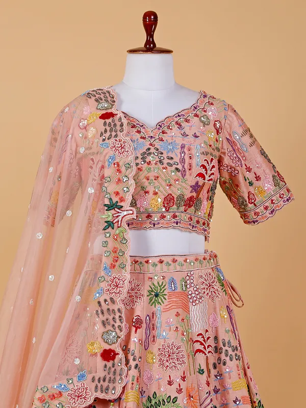 Peach raw silk lehenga choli with embroidery