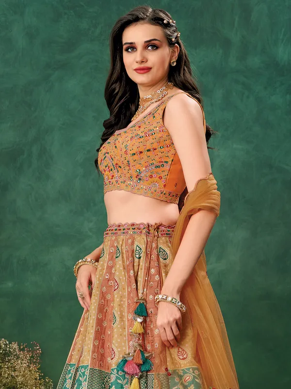 Peach raw silk lehenga choli with print for wedding