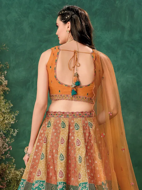 Peach raw silk lehenga choli with print for wedding
